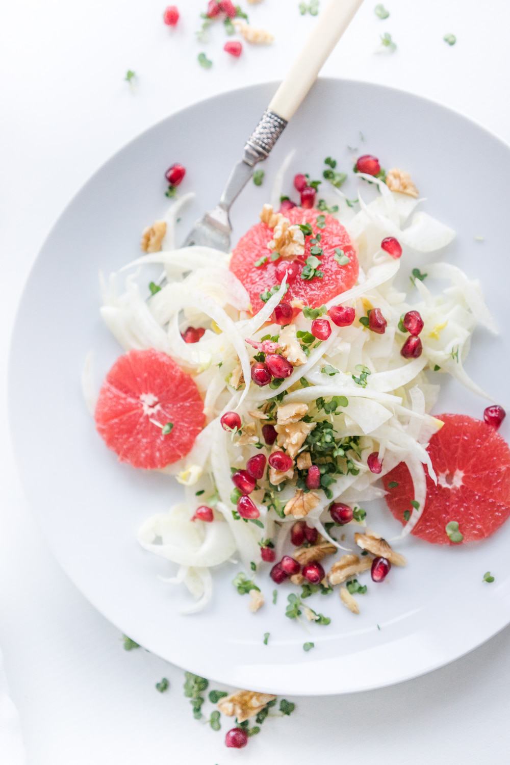 A festive and colourful salad that will brighten up any winter day. A delicious mix of crunchy pomegranate seeds and walnuts with grapefruit and fennel.