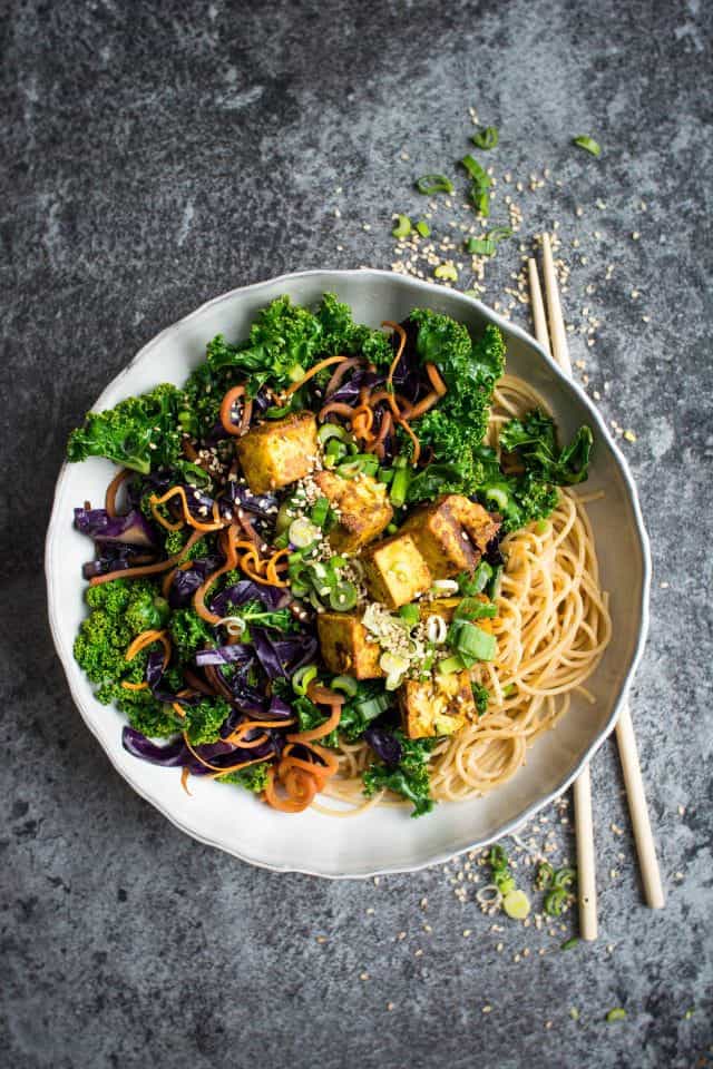 This Kale Stir-Fry is super-nutritious. It's perfect if you need a quick dinner ready in under 30 minutes. Its main ingredients are kale, cabbage and carrots. And the marinated tofu adds a great punch to the dish.