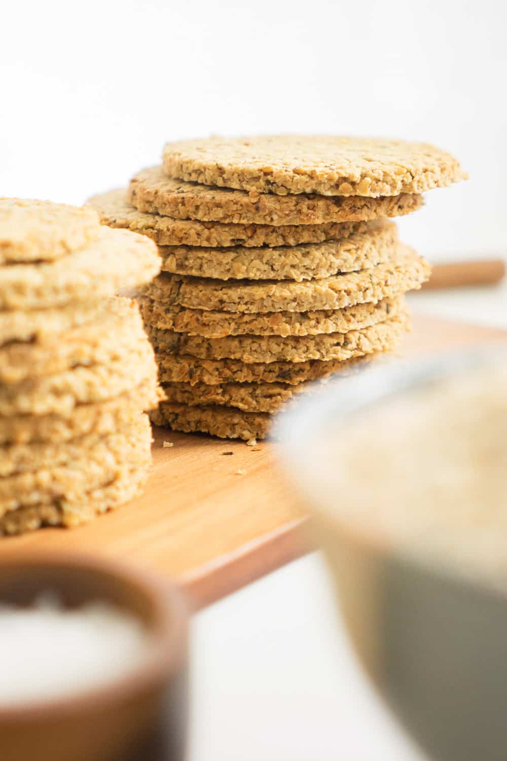 Side view of 2 stacks of healthy oatcakes. 