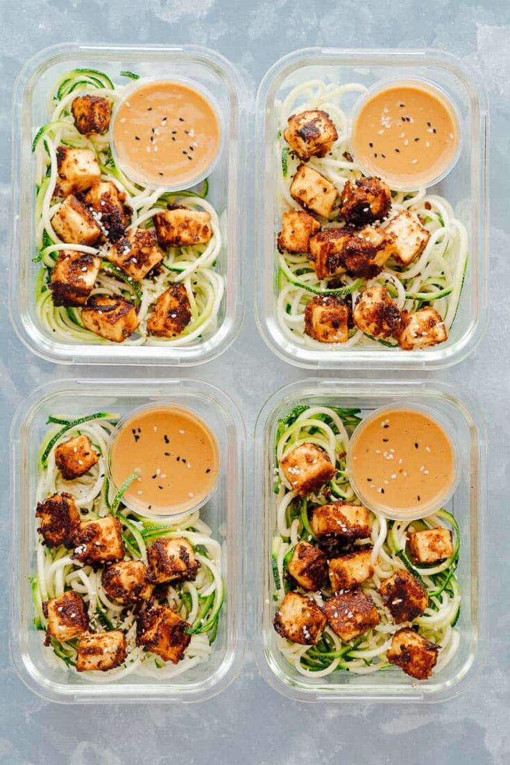 Top view of meal prep bowls with zucchini noodles