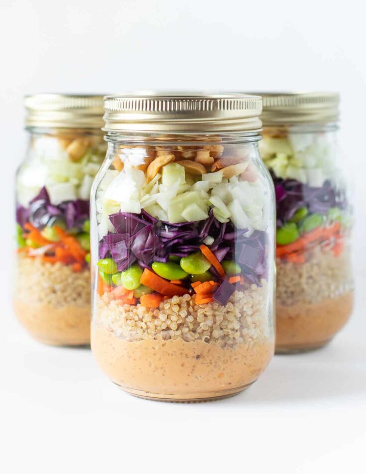 Peanut crunch salad in glass jars