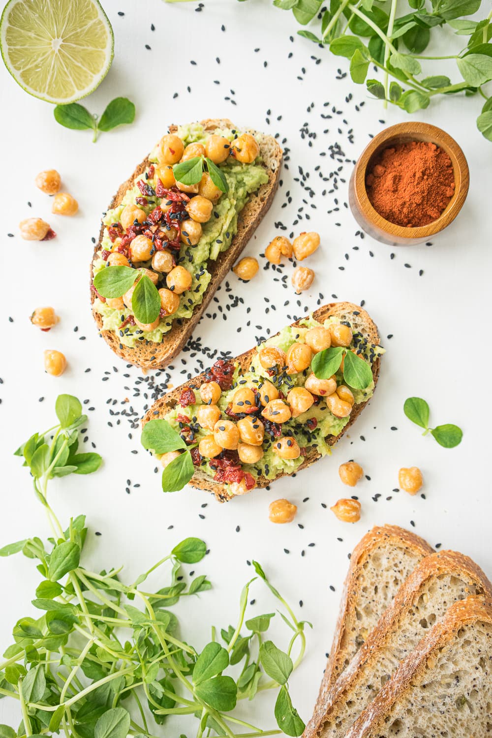 Top view of 2 avocado toast with chickpeas