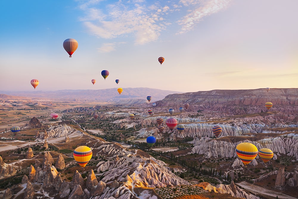 Hot air balloon flying over Cappadocia Turkey