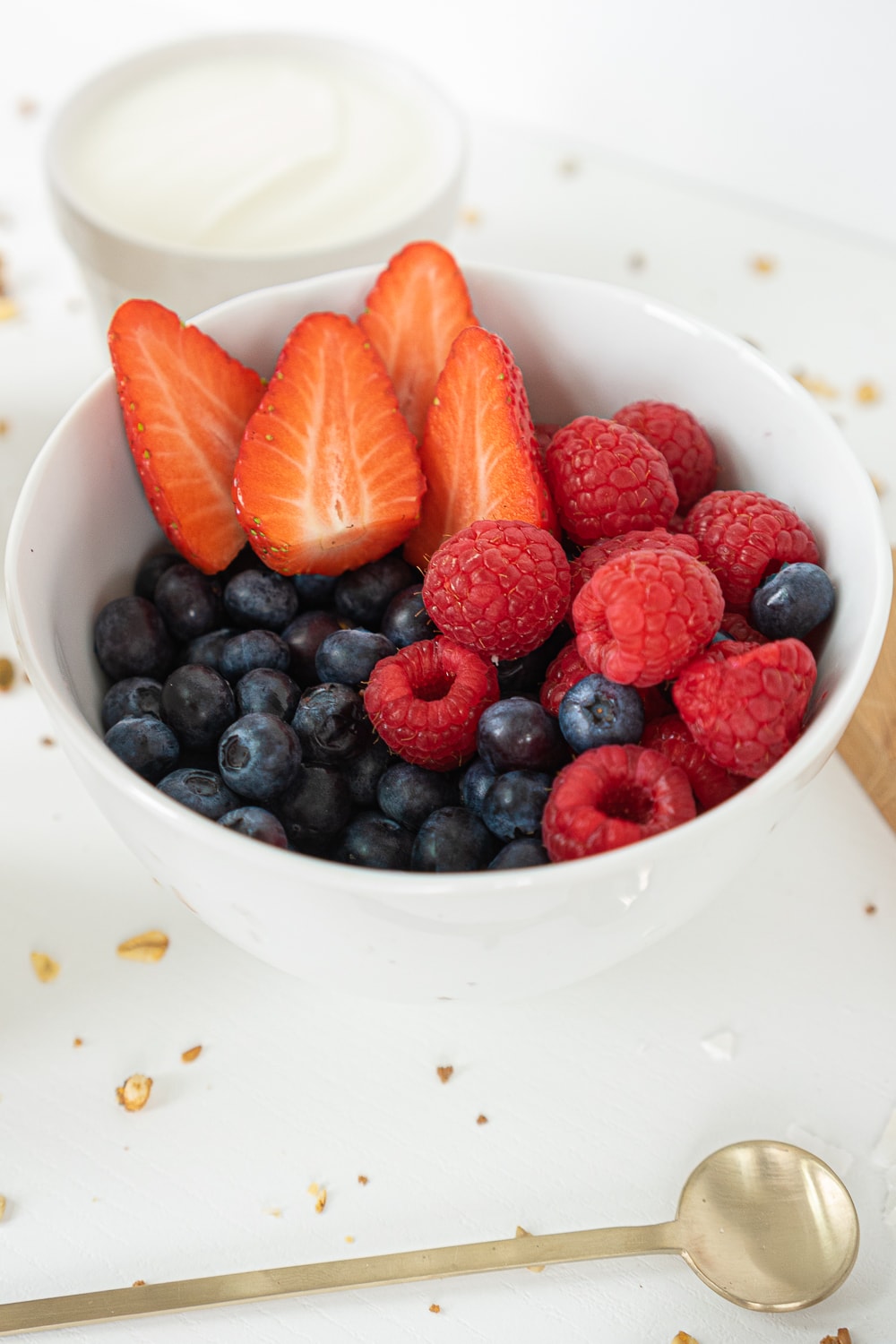 Mixed berries in a white bowl