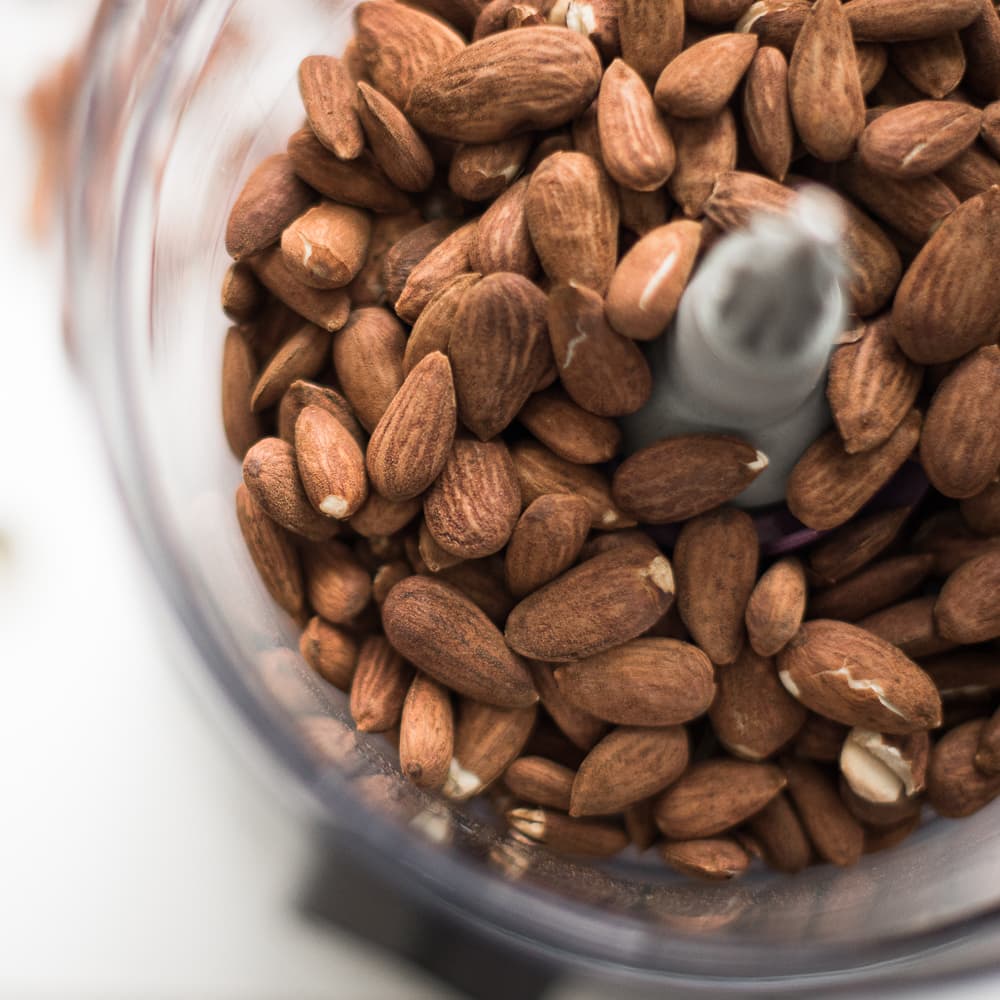 Whole almonds in a food processor