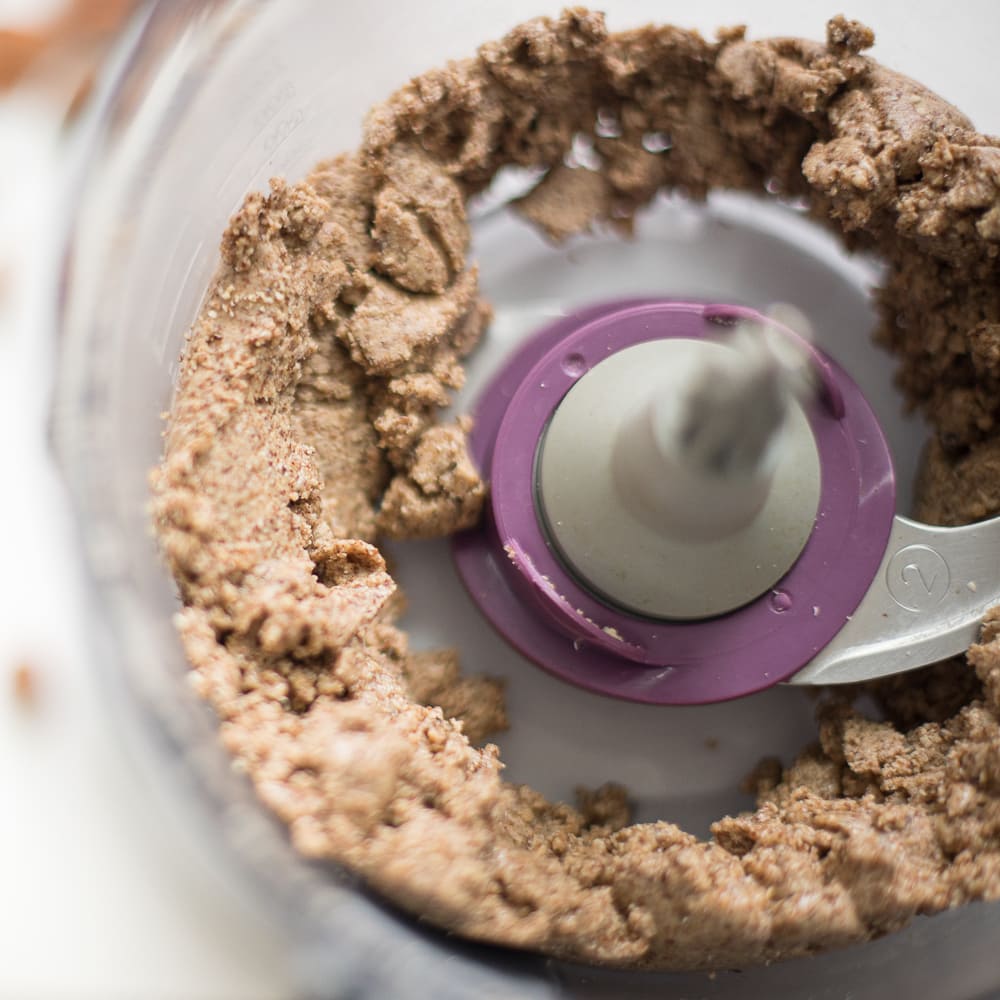Almond paste forming in a food processor