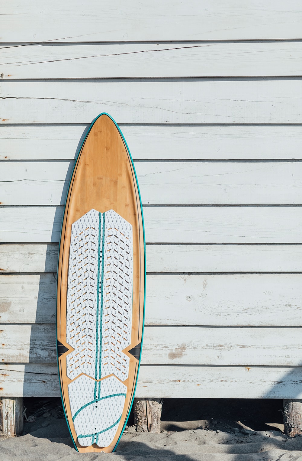 Surfboard against wall 