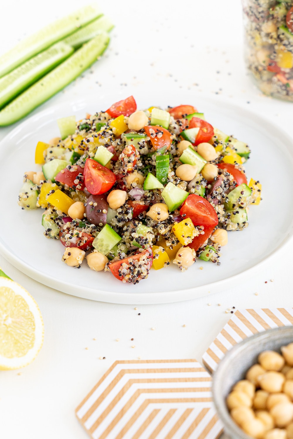 Three quarter view of Mediterranean Quinoa salad on a while plate