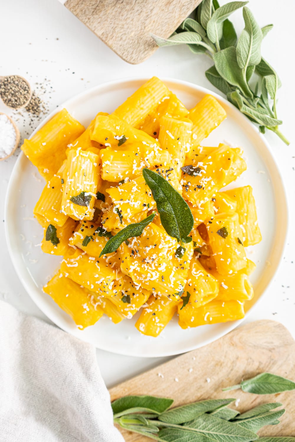 Top view of creamy butternut squash pasta with sage
