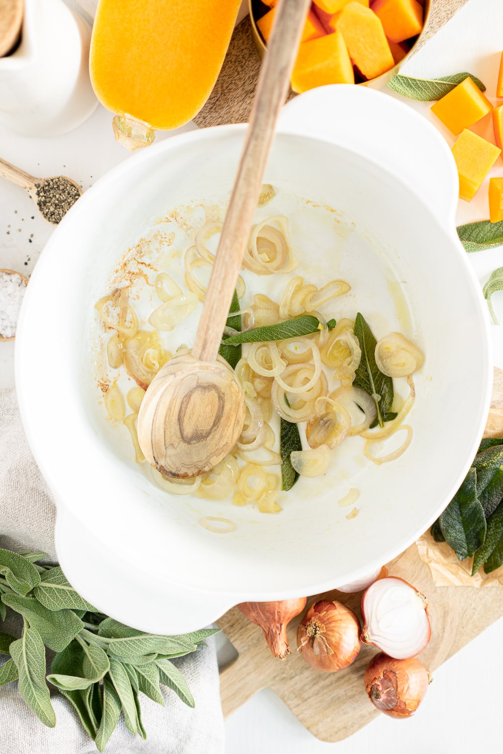 Top view of pan with onions and sage