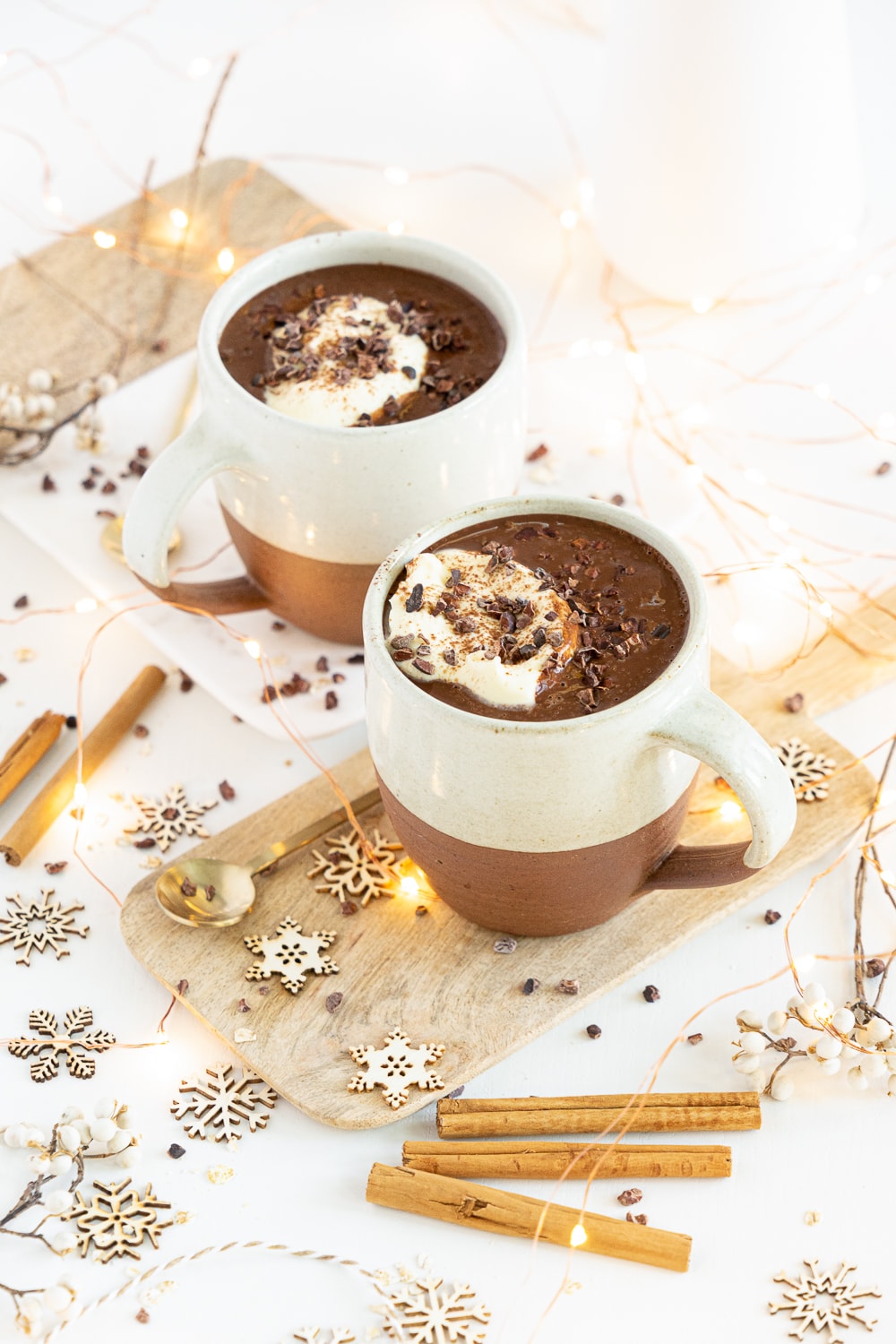 Three quarter view of healthy hot chocolate mugs
