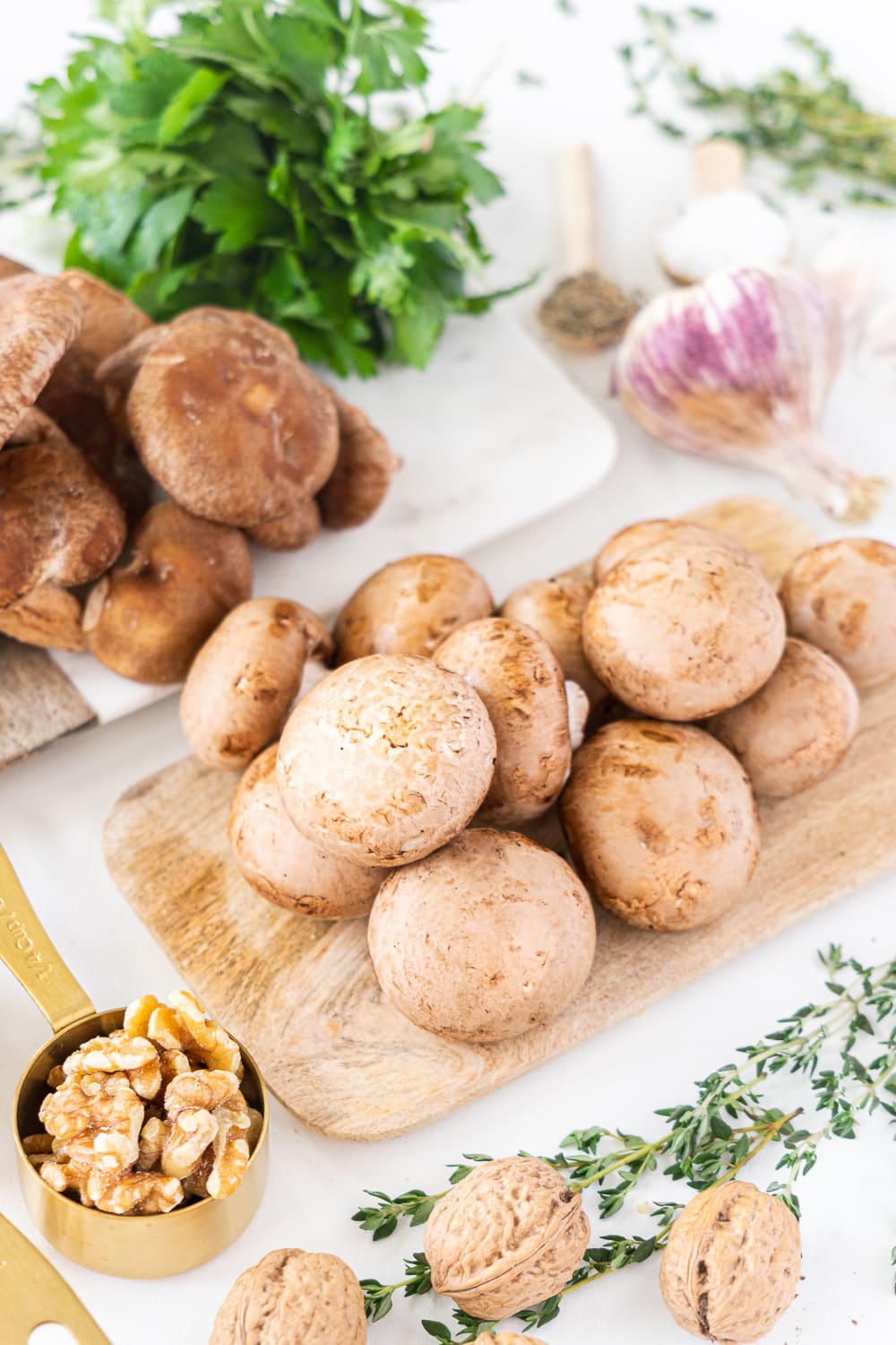 Three quarter view of all ingredients needed to make vegan mushroom pasta
