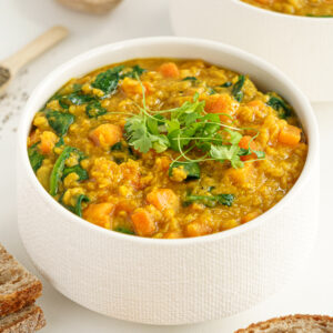 Close up of a bowl with red lentil soup