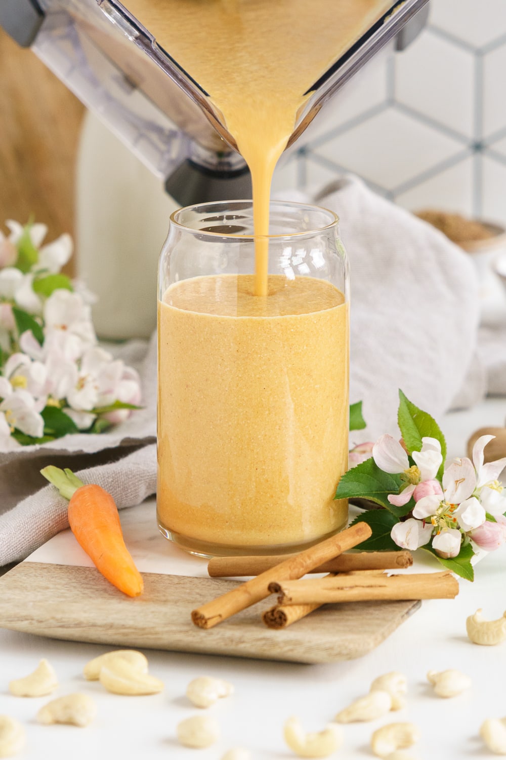 Pouring the smoothie in a glass