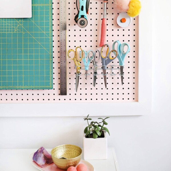 Organizing wall for craft accessories - Image from A Beautiful Mess