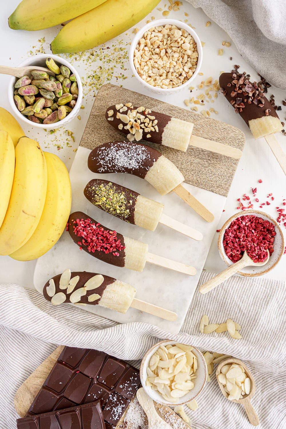 Top view of 6 frozen chocolate bananas
