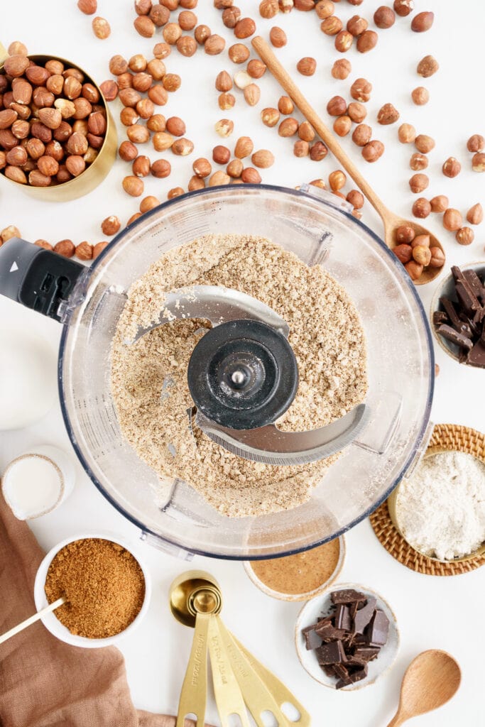 blender bowl with blended hazelnuts and flour