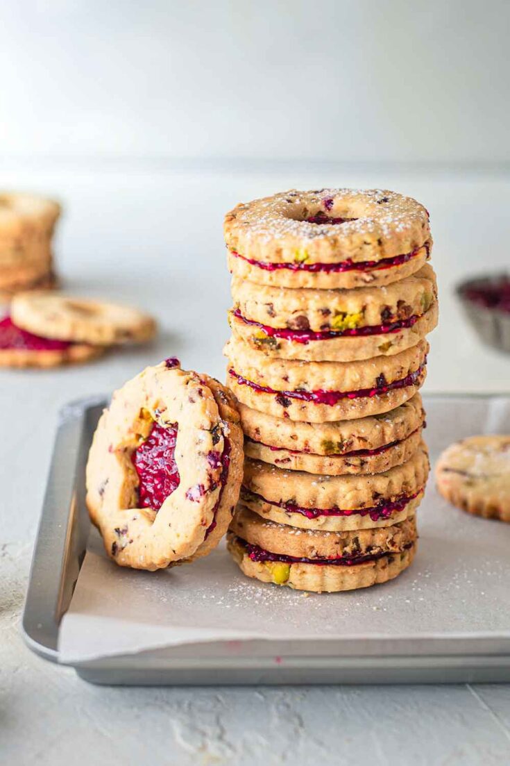 Pistachio and Cranberry vegan Linzer Cookies in Plate