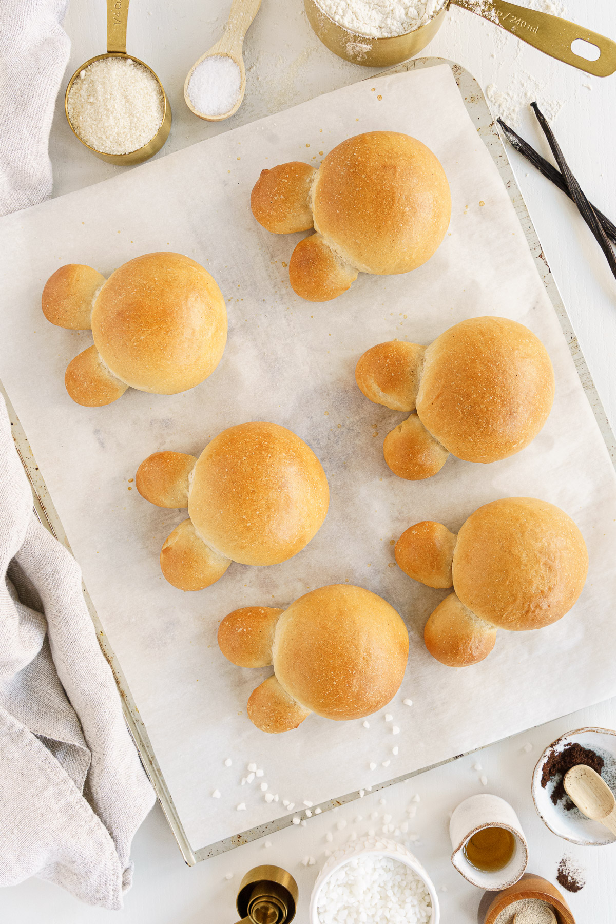Fresh baked brioche bunnies on a tray.
