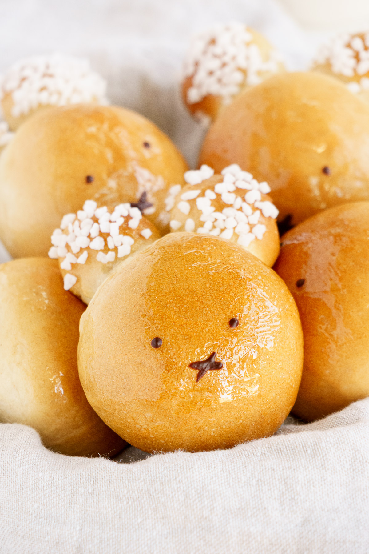 Closeup of vegan brioche bunnies in a basket.