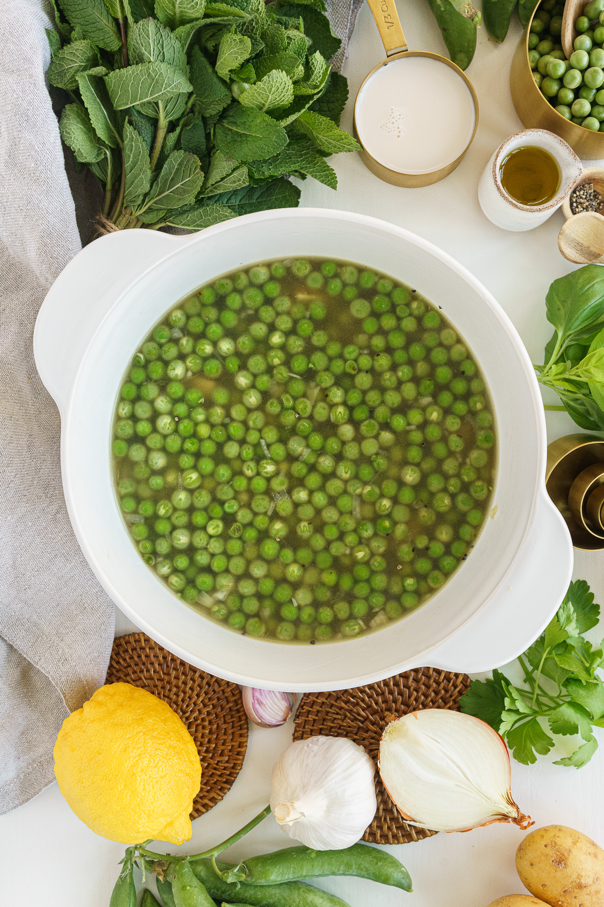 Cooked fresh pea soup in the pot.