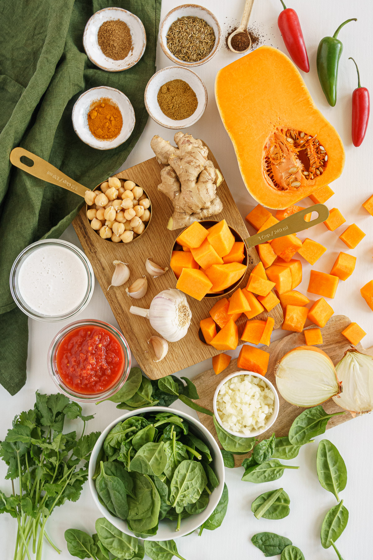 Ingredients to make butternut squash curry on the table.