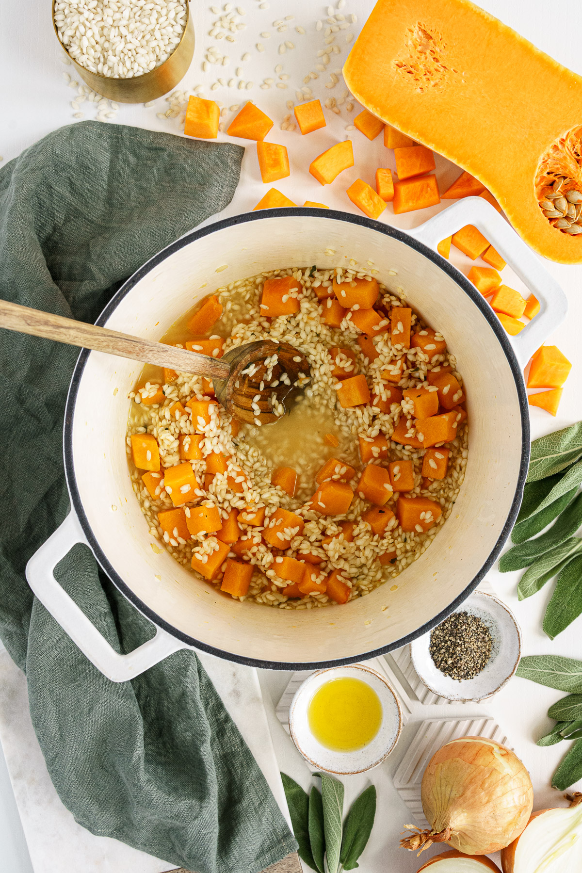 Rice added to pot to make butternut squash risotto.