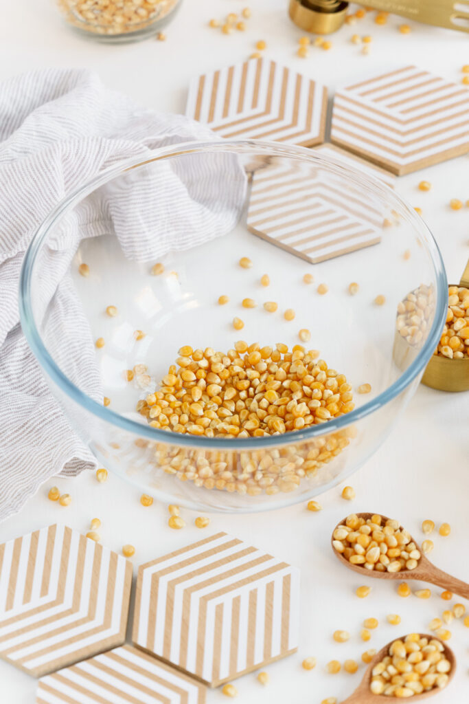 Popcorn kernels in a glass bowl