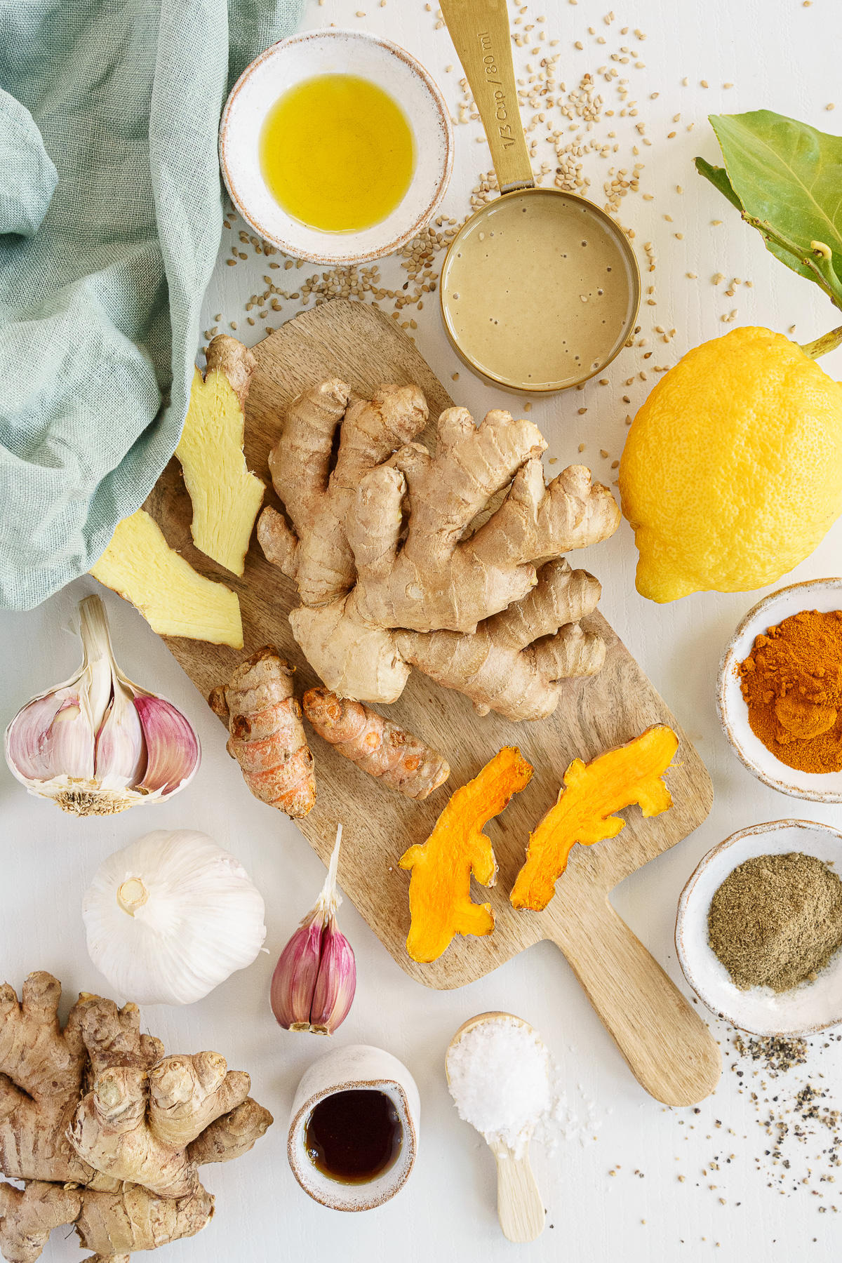 Ingredients to make turmeric tahini dressing on the counter.