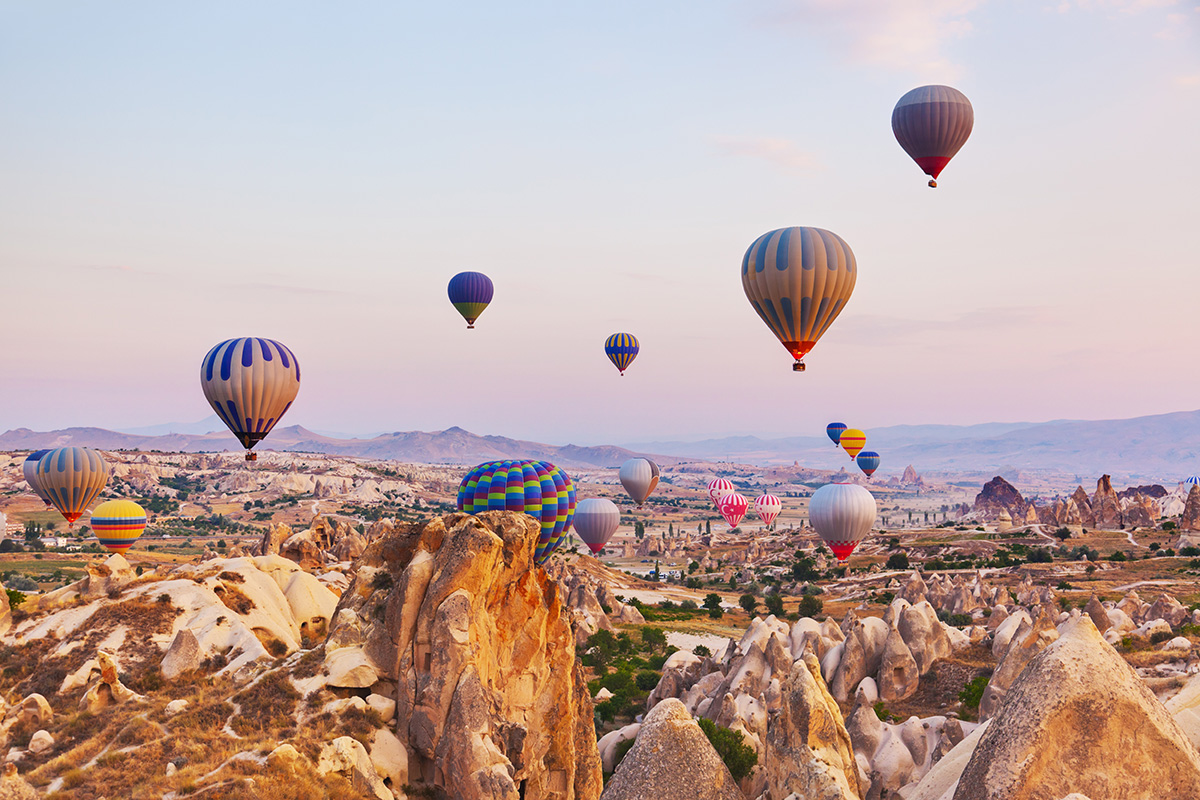 Hot balloons flying over Cappadocia in Turkey