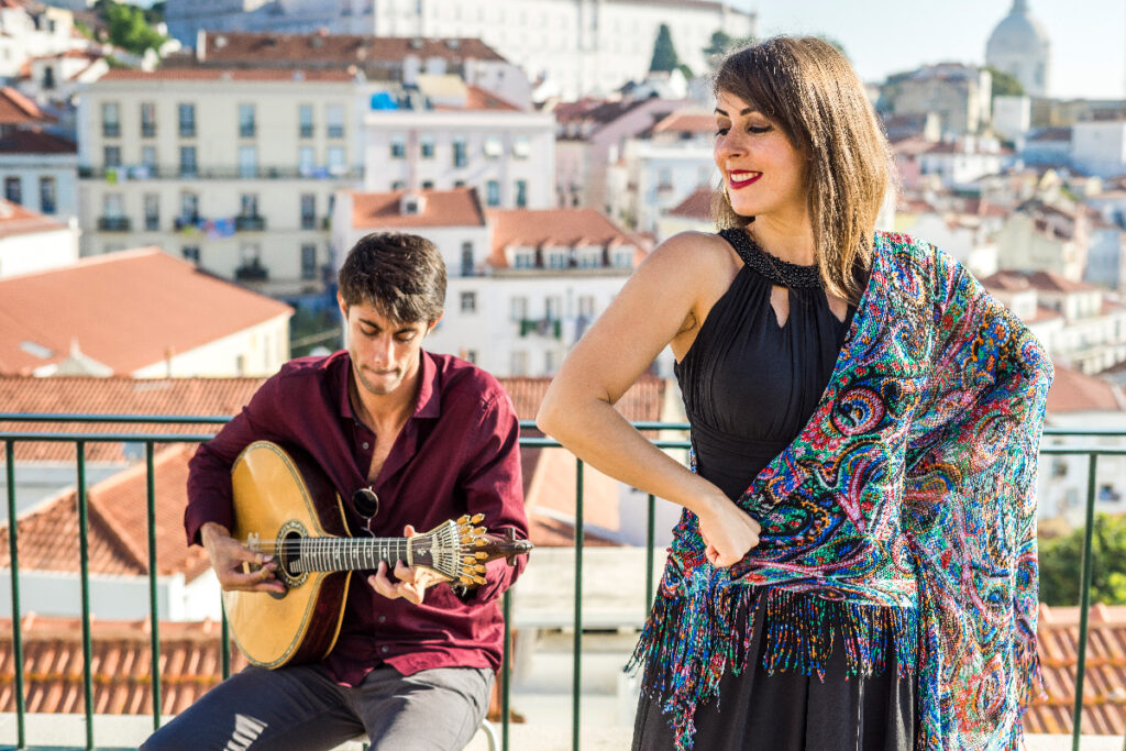 A singer performing Fado, a typical Portuguese experience