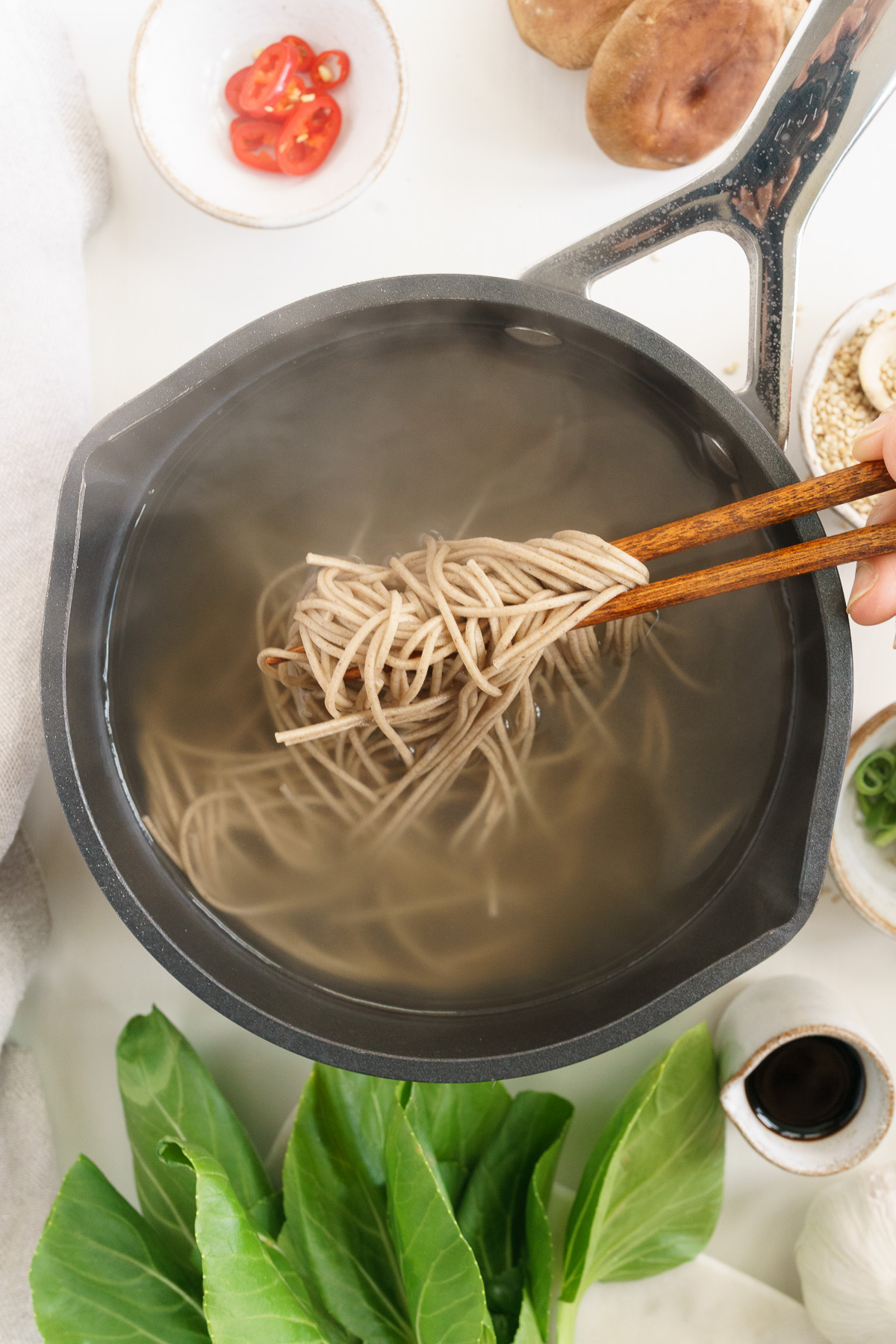 Cooking vegan ramen noodles in a pot