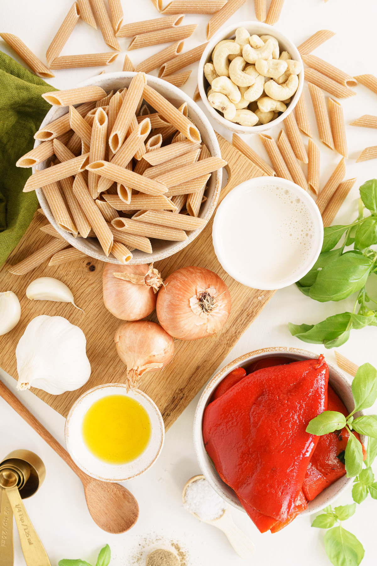 roasted red pepper pasta ingredients pasta, onion, garlic, olive oil, unsalted cashew nuts, shallots, almond milk, fresh basil leaves,roasted red peppers, and salt