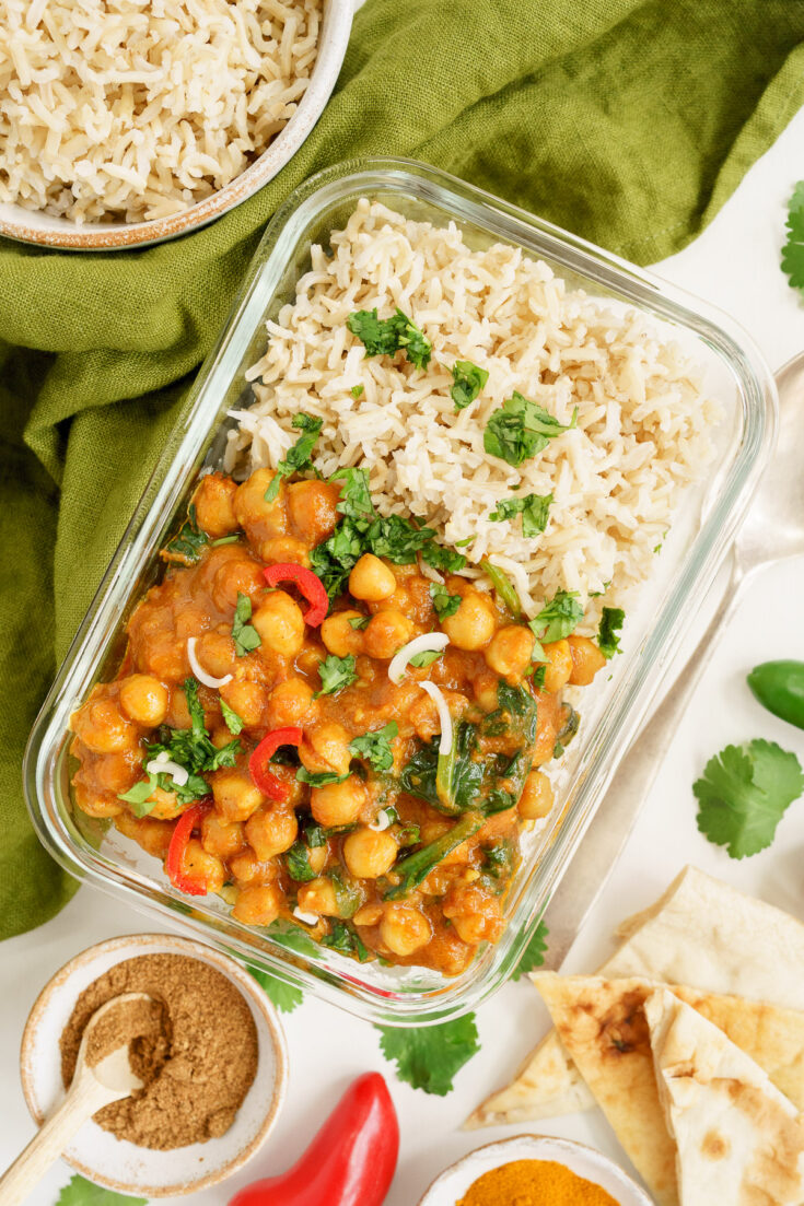 Chickpea curry in a glass container for meal prep