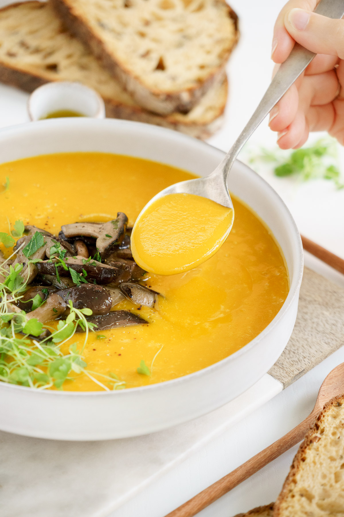 close up photo of pumpkin soup in a bowl