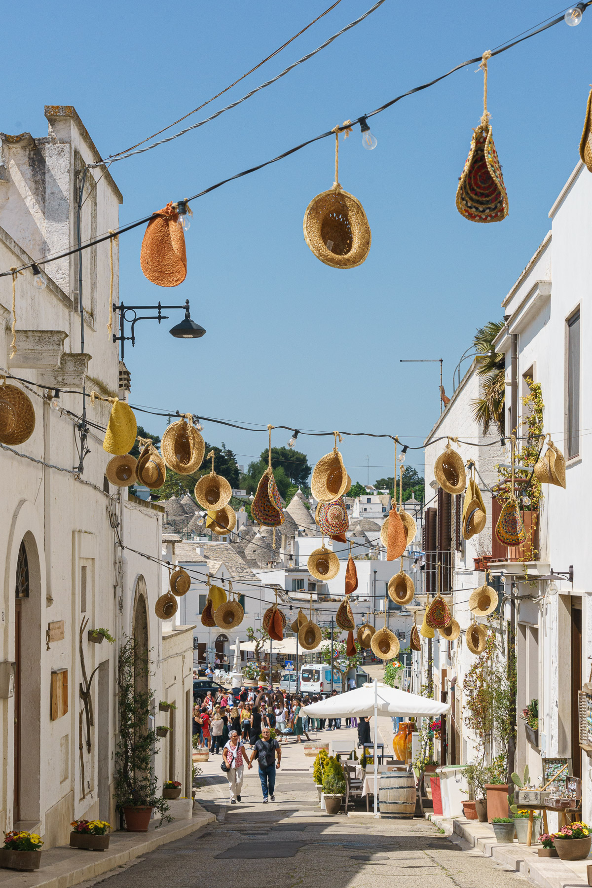 cute hats in via Brigata Regina in Alberobello
