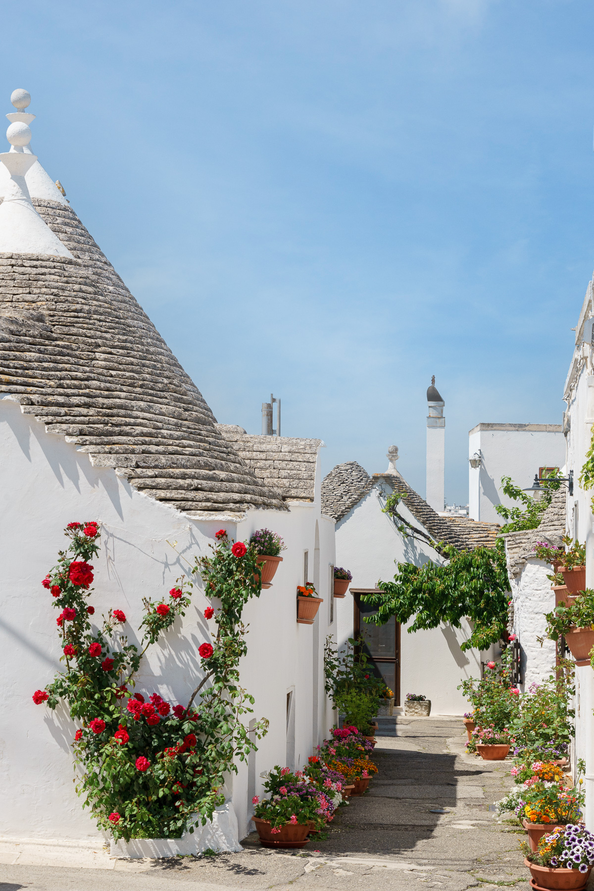 A cute street in Rione Monti in Alberobello, Puglia, Italy