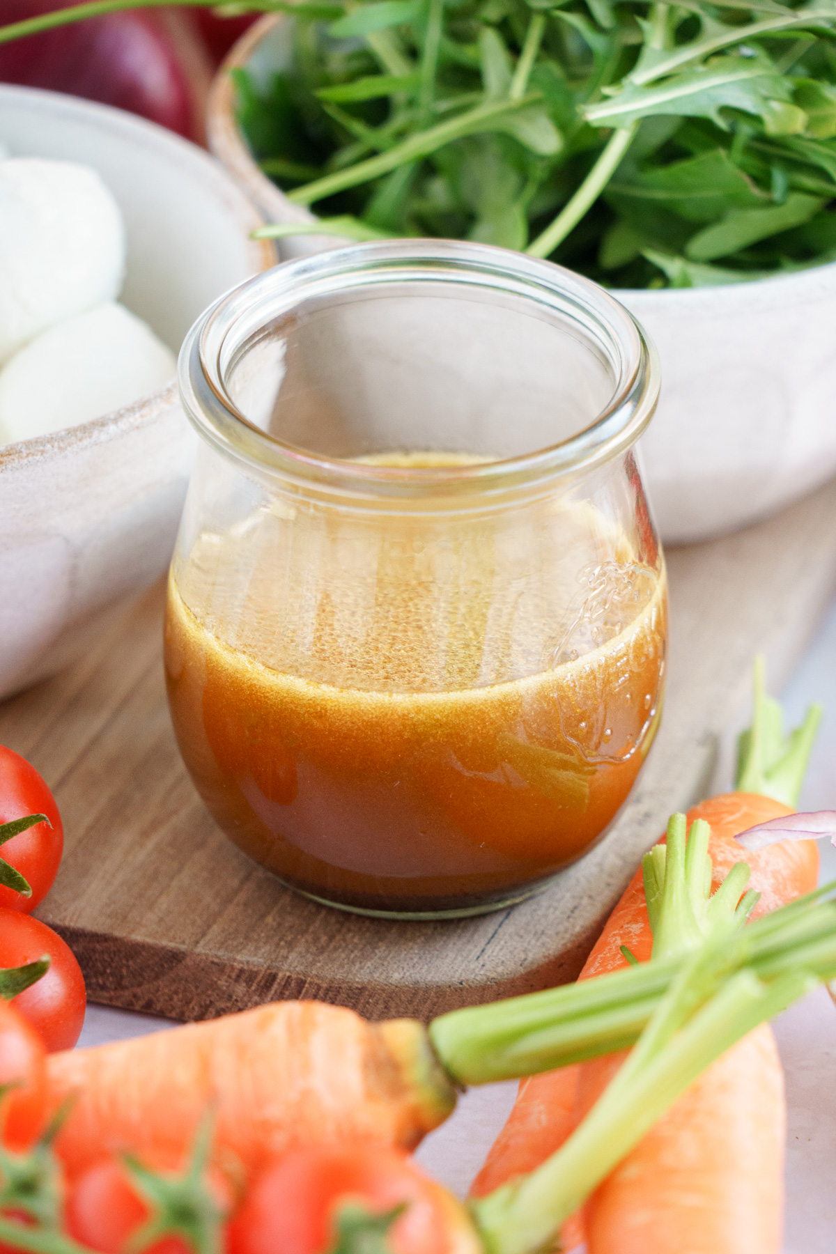 a mix of olive oil, vinegar and salt in a mason jar