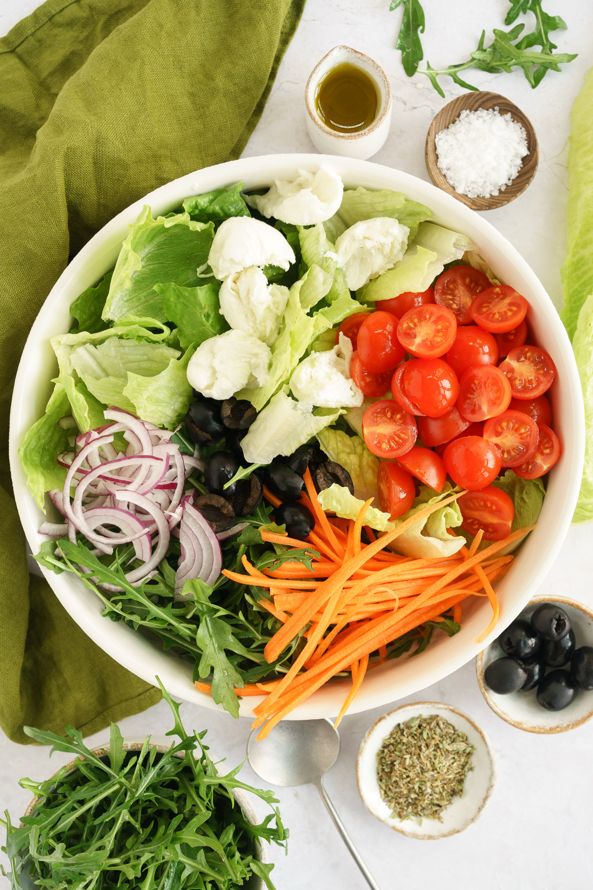 italian salad ingredients mix together in a bowl