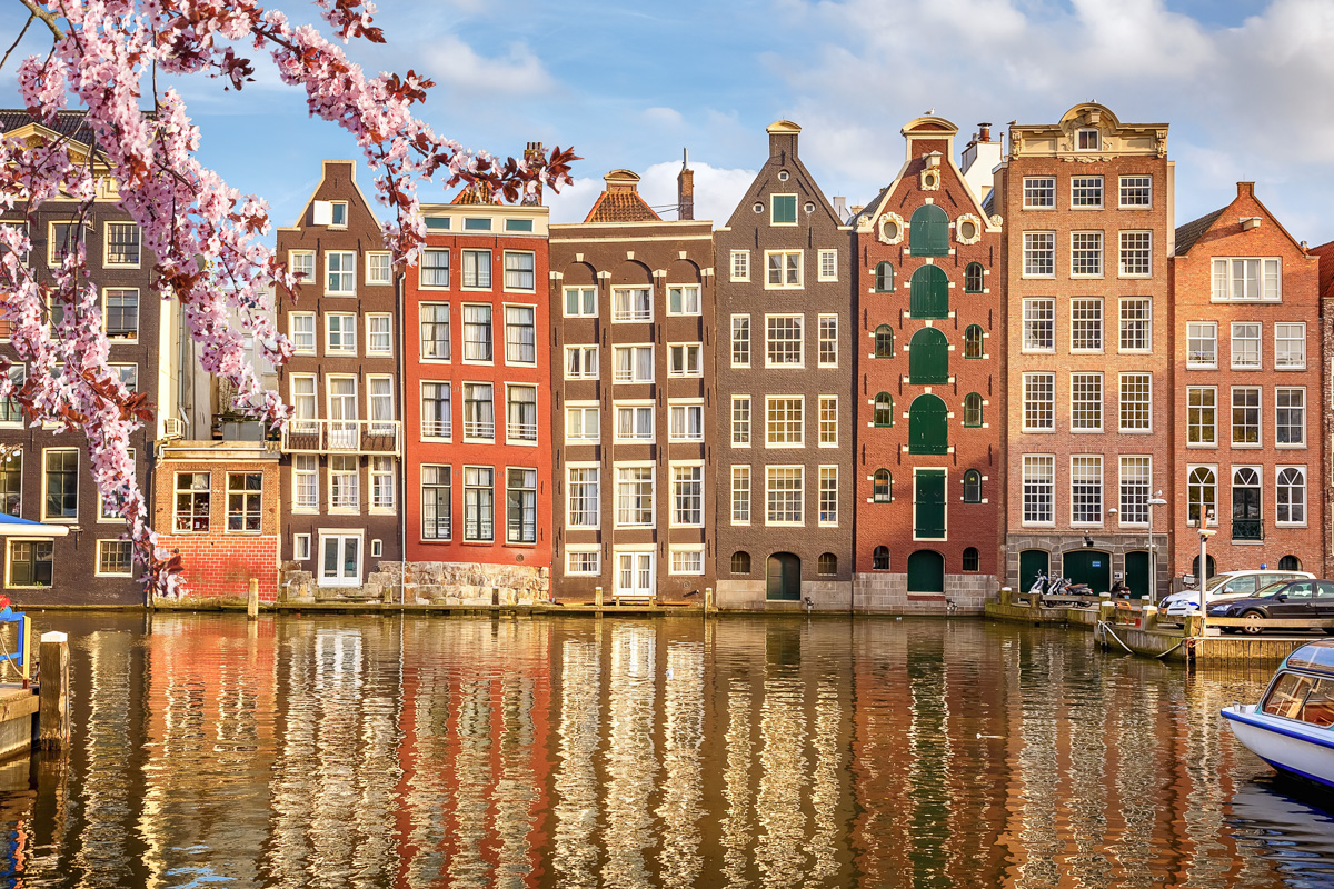 Traditional old buildings in Amsterdam at spring, the Netherlands