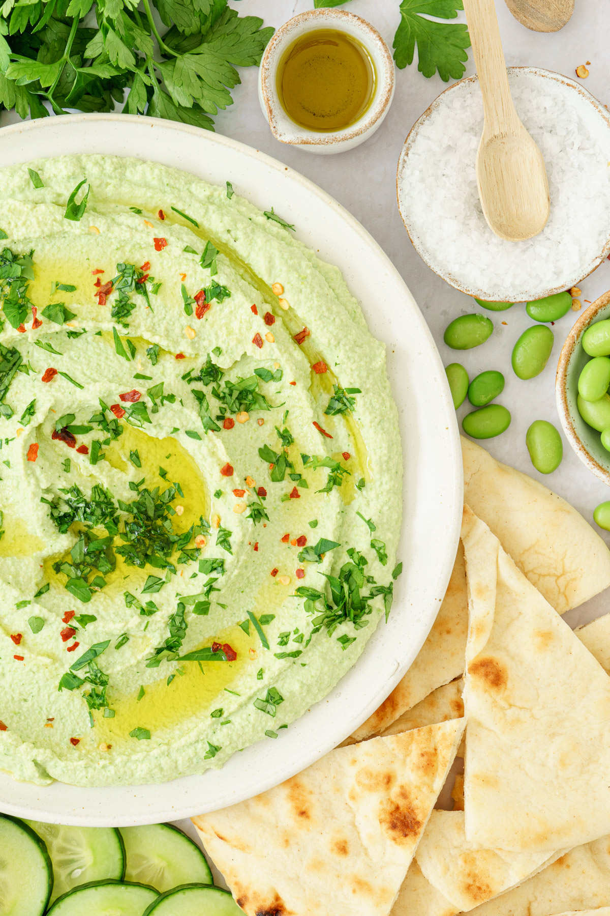 half image of an edamame hummus in a bowl