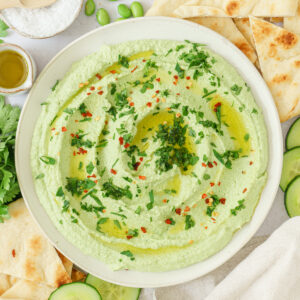 cropped image of edamame hummus in a round plate