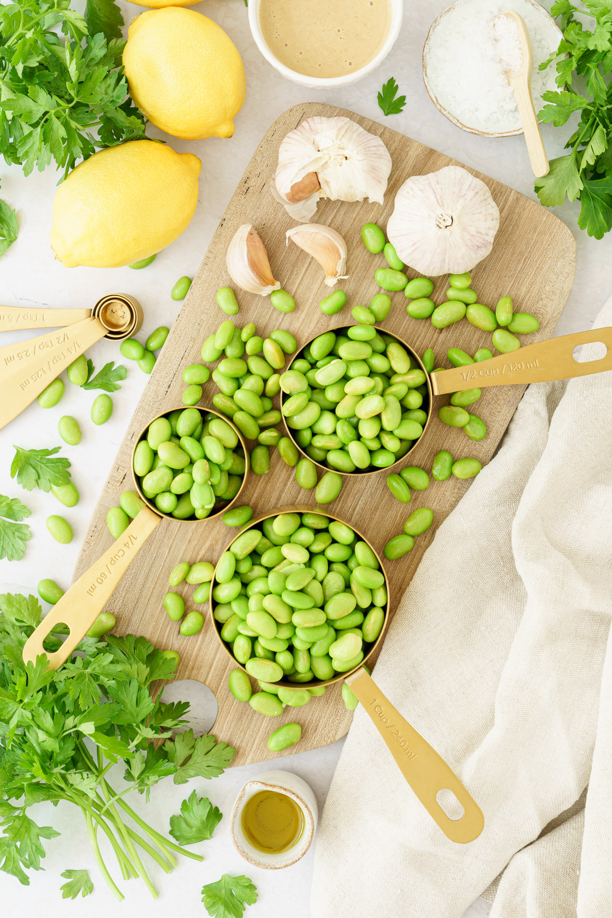 top view image of edamame ingredients scattered on top of the table
