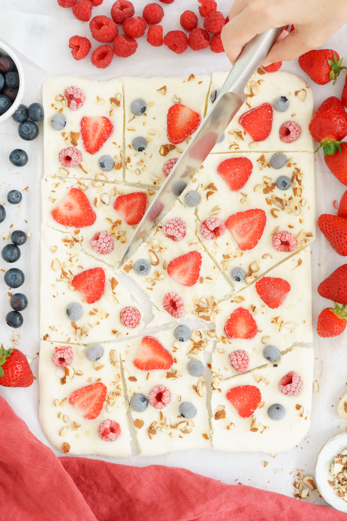 top view image of the frozen yogurt bark cut with a knife