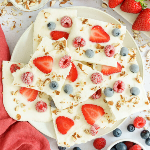 cropped image of the cut frozen yogurt bark in a plate