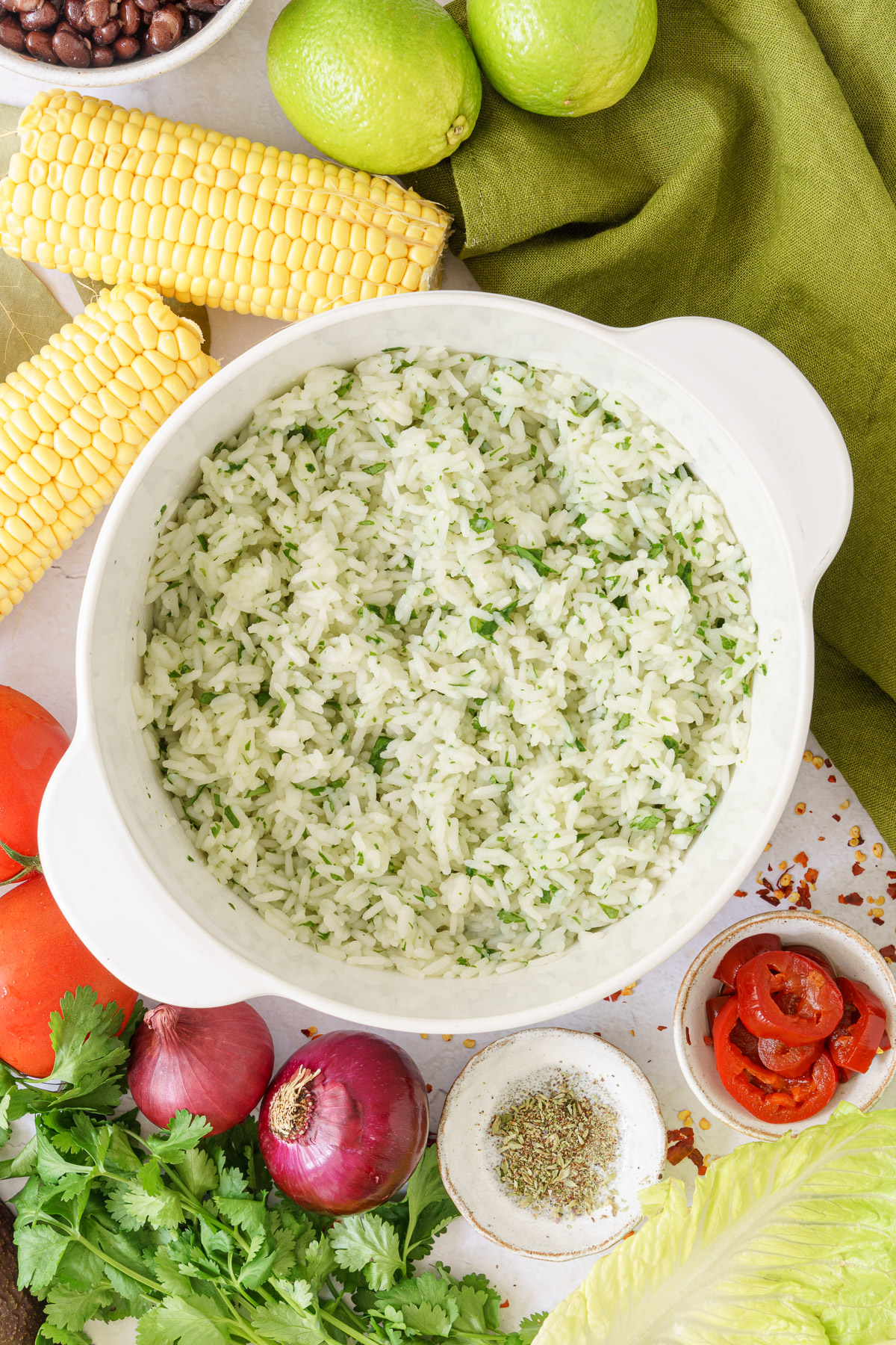 top view image of a pan with cooked cilantro rice 
