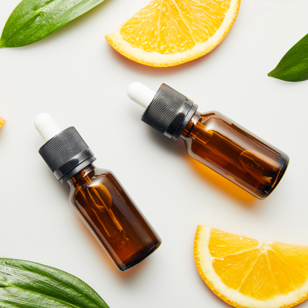 top view image of two bottles of essential oils