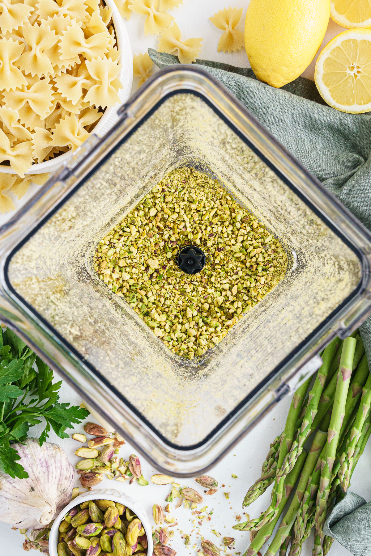 Blender filled with chopped pistachios