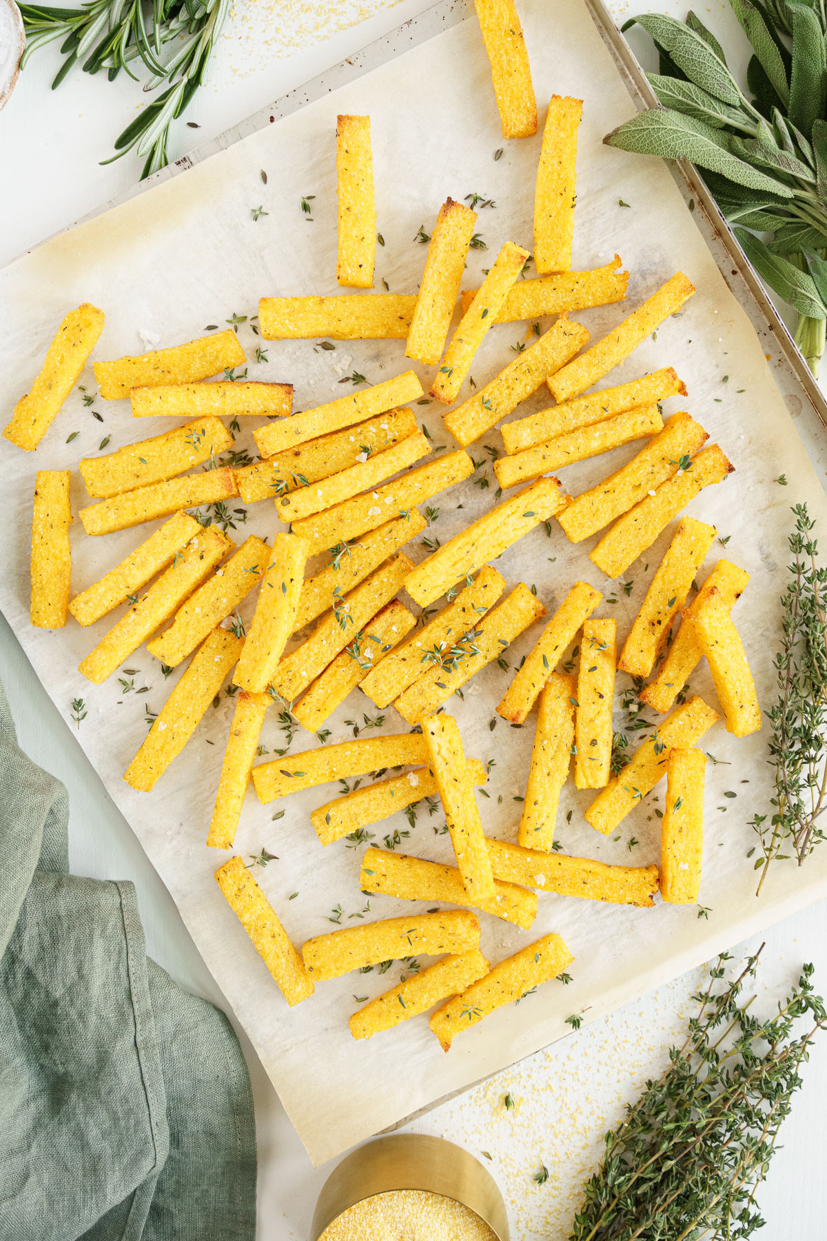 Cooked polenta fries with salt and herbs