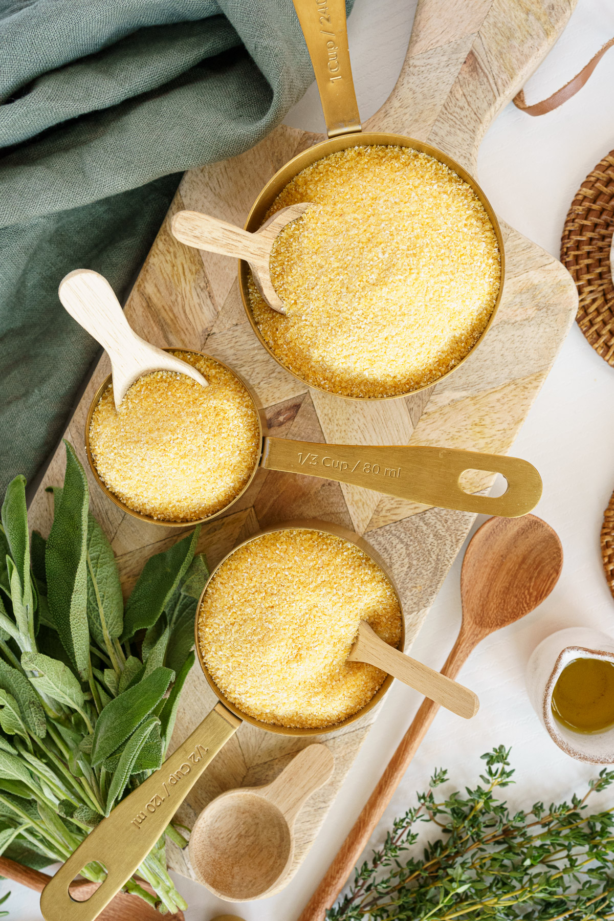Uncooked polenta in different measuring cups to make polenta fries